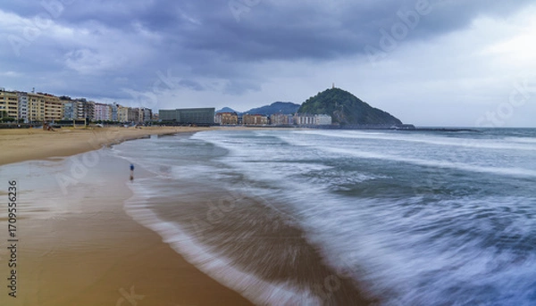 Fototapeta Zurriola is the soul of the city of Donostia. It is the perfect place to feel the energy of San Sebastián, where the sea merges with urban elegance.