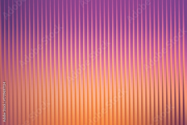 Fototapeta A vibrant gradient of purple and orange creates a striking vertical striped pattern, offering a warm and energetic abstract background design