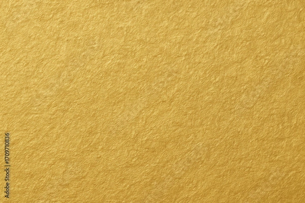 Fototapeta Golden Paper Texture: A close-up shot of a luxurious golden paper texture reveals intricate patterns and a warm, inviting aesthetic. Perfect for design backgrounds and branding.