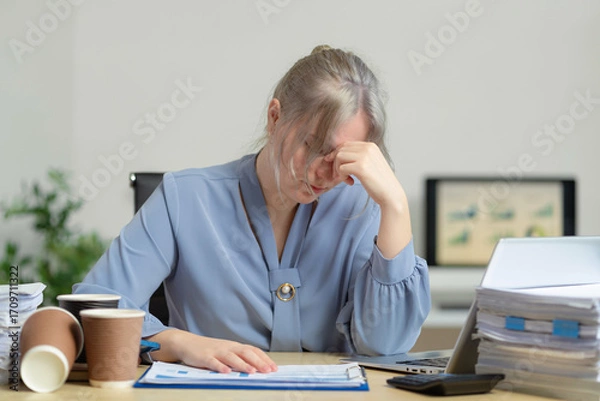 Fototapeta Business woman are under stress from working for poor work, failed work.