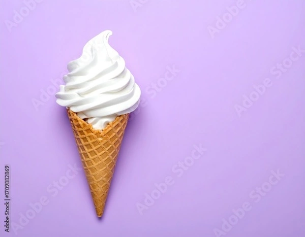 Fototapeta Vanilla soft serve ice cream cone