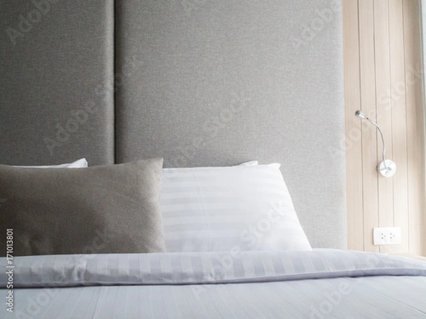 Fototapeta Interior of cozy bedroom in modern design.low lighting and Lens flair in sunlight. color effect.