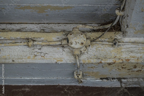 Obraz JUNCTION BOX - An antiquated surface electrical installation on a wooden building structure