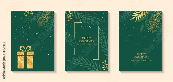 Fototapeta Luxury set of cards for Christmas and New Year greetings. Golden branches, a gift, and a fir tree on a green background.