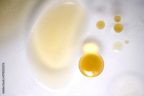 Fototapeta Glimmering Oil Droplets on Smooth Surface in Natural Light