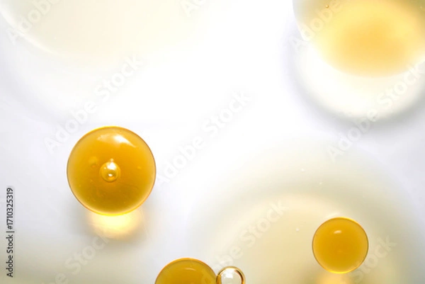 Fototapeta Yellow Droplets on White Background with Circular Shapes and Shadows