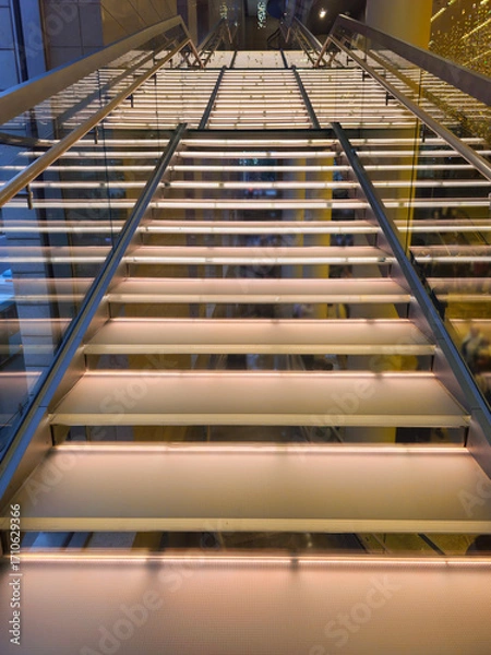 Fototapeta Staircase with illuminated steps in a modern interior