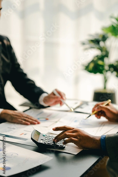 Fototapeta The financiers are calculating personal taxes for their customers