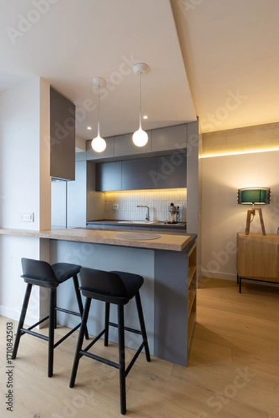 Obraz Kitchen interior with bar chairs and counter