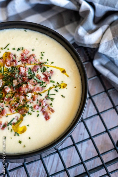 Obraz Homemade recipe for white vegetable cream soup with ham
