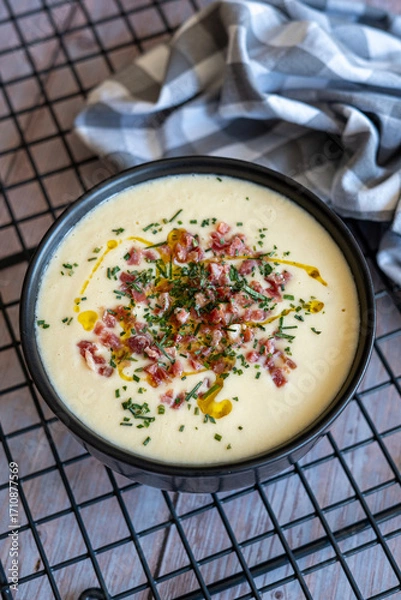 Obraz Homemade recipe for white vegetable cream soup with ham