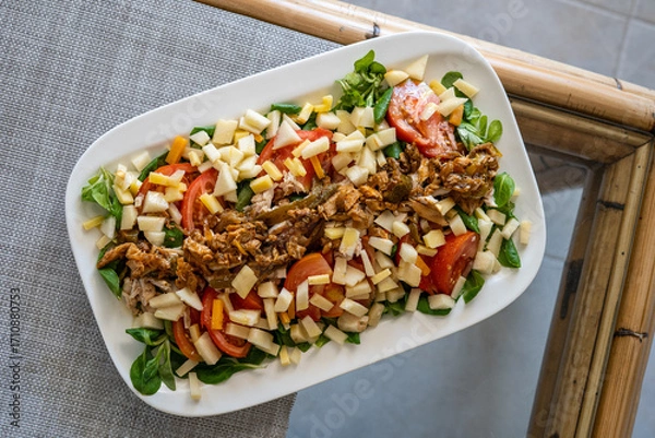 Obraz homemade recipe for fresh salad with ingredients such as apple or meat
