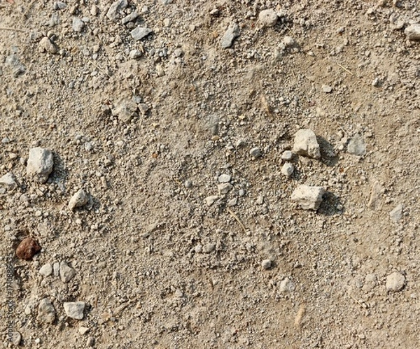 Fototapeta A close view of the hard dirt surface.