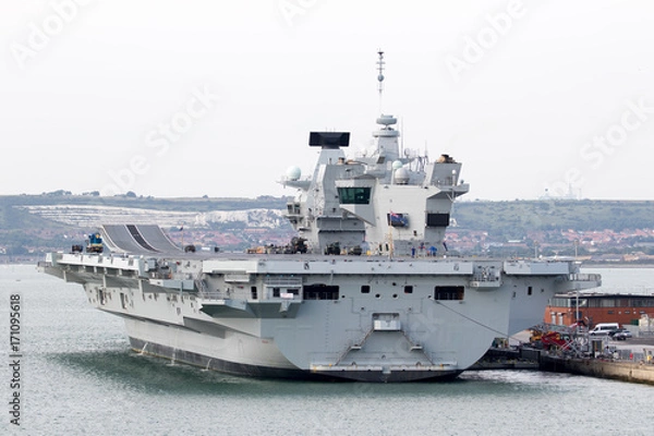 Fototapeta Aircraft Carrier in Port