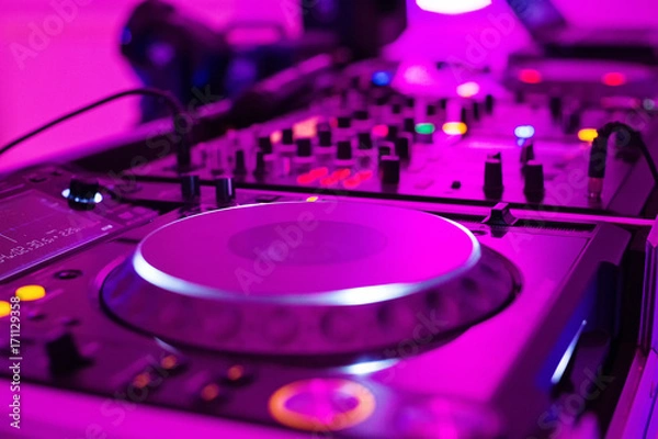Fototapeta Close-up photo of pro DJ Controller in purple light