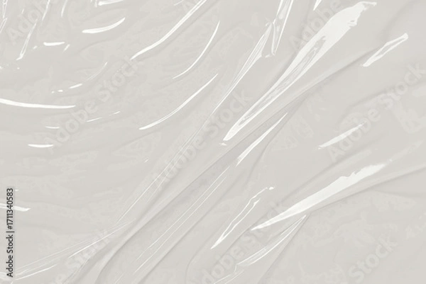 Fototapeta Crumpled clear plastic sheet with bright lighting, suitable for graphic design projects, website backgrounds, and presentations.