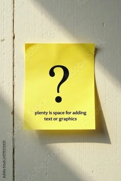Fototapeta A bright yellow sticky note affixed to a textured off-white surface displays a large question mark, leaving ample space for customized text or graphic additions.