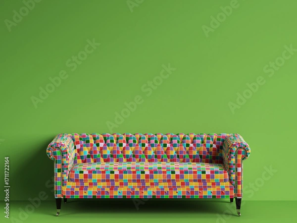 Fototapeta Classic tufted sofa in multicolor patches fabric on green background with copy space