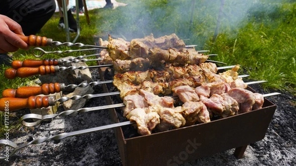 Obraz Shashlik is being grilled on the barbecue.