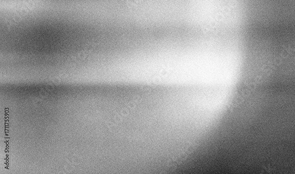Fototapeta Stippled grain texture background. Black sprayed dots gradient wallpaper. Rough noisy sand dotted backdrop.