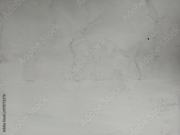 Fototapeta Gray concrete wall with weathered and rugged texture