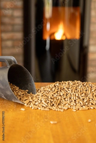 Obraz Heating pellets on a wooden table