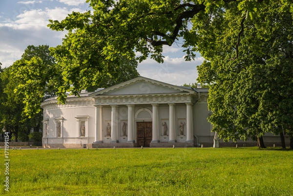 Fototapeta Kitchen building of the Elagin Palace. View from the palace. Yelagin Island. Architect Carl Rossi. Saint Petersburg. Russia. Summer