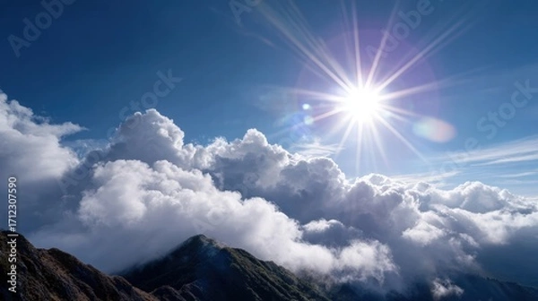 Obraz Breathtaking Mountain Scene with Sun and Clouds
