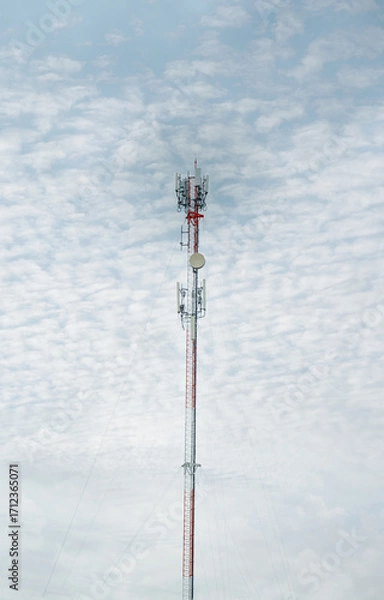 Fototapeta Signal tower or Mobile phone tower .Global connection and internet network concept.on blue sky,Telecommunication tower.