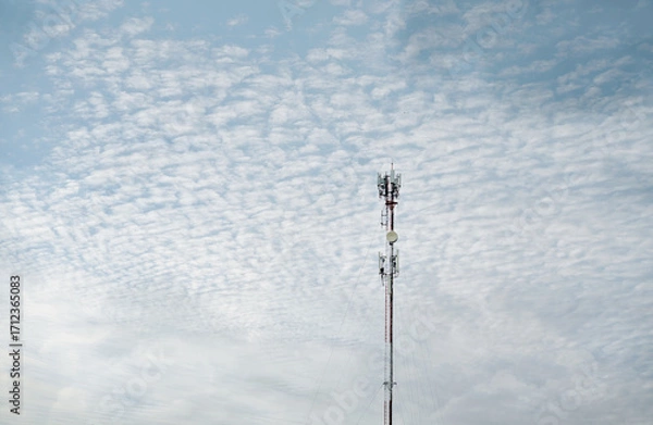 Fototapeta Signal tower or Mobile phone tower .Global connection and internet network concept.on blue sky,Telecommunication tower.