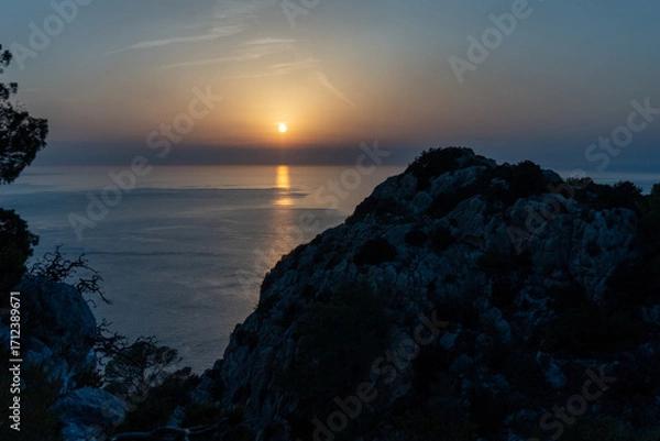 Obraz sunset over the ocean