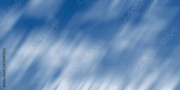 Fototapeta Abstract blue and white background with soft, blurred diagonal streaks and wispy cloud-like formations, creating a sense of motion and atmospheric depth