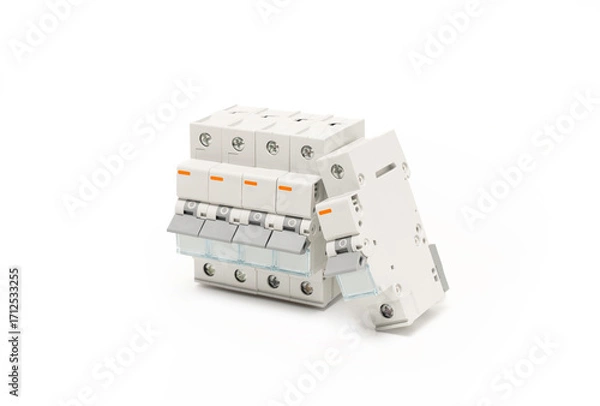 Fototapeta Automatic circuit breakers on white background. Studio shot.