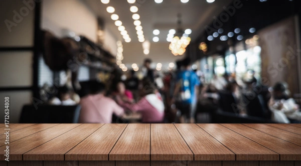 Fototapeta Empty wooden table top with lights bokeh on blur restaurant background.	
