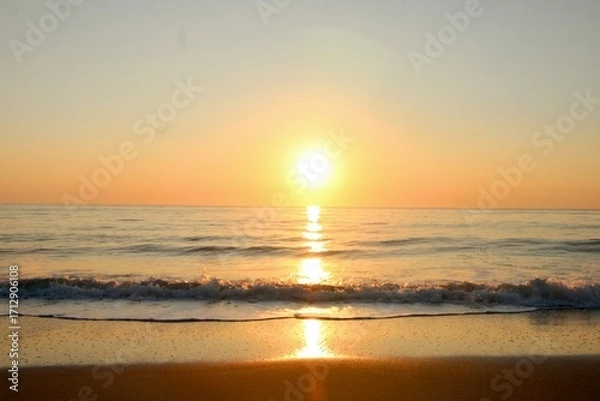 Obraz Sunrise reflections on the beach 