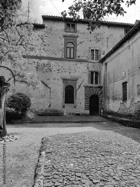 Fototapeta Lunghezza, Rome - April 15, 2025, detail of part of the courtyard of Lunghezza Castle, a medieval castle in the municipality of Rome.
