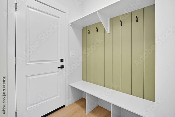 Fototapeta White door with a black handle and a white doorknob