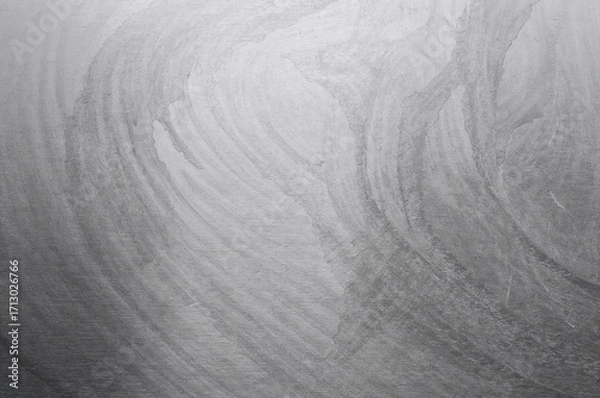 Fototapeta Glossy silver brushed metal panel backdrop. Abstract metallic texture surface. Polished platinum chrome sheet material.