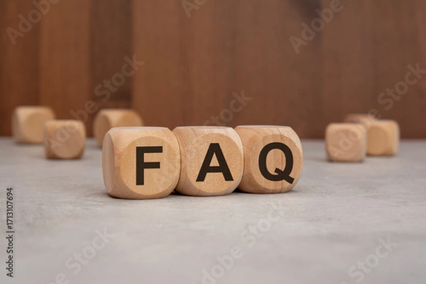 Fototapeta wooden cubes with the word FAQ on a table