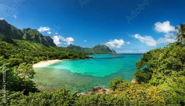 Fototapeta A Tranquil Beach Cove With Clear Turquoise Water Framed By Lush Tropical Foliage And Distant Mountains