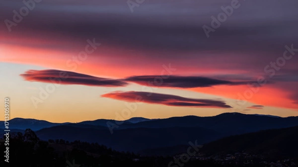 Fototapeta Sunset, beautiful rosy clouds, and the afterglow on the horizon