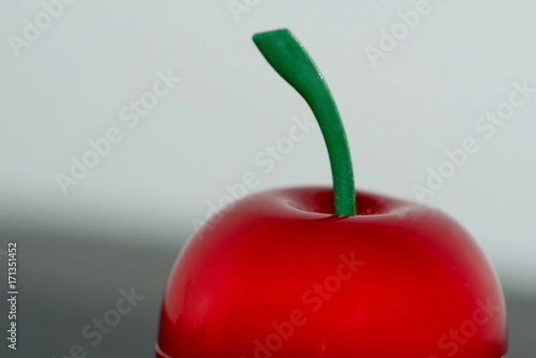 Obraz Green Stem of a Red Apple
