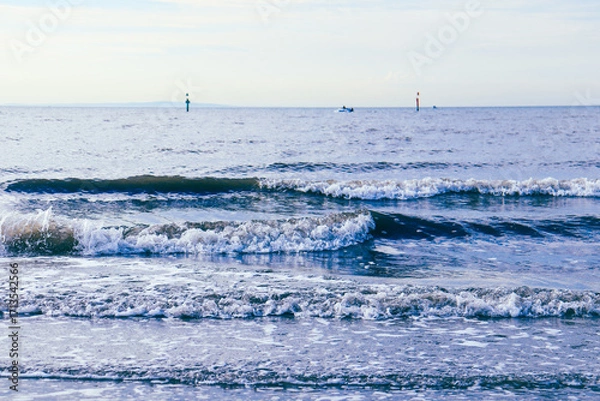 Obraz boat in the water in rough winter waves
