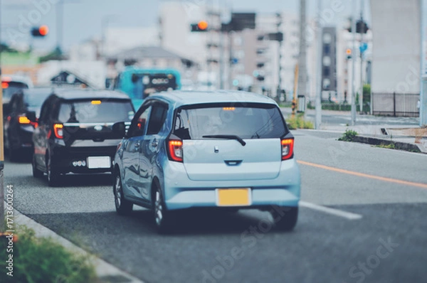 Fototapeta 信号待ちの軽自動車の後部