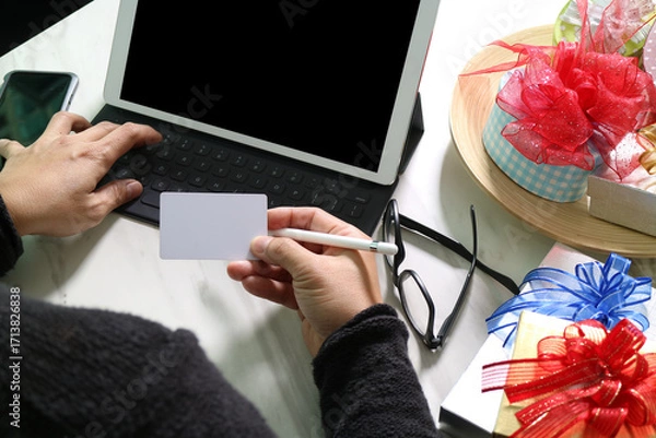 Fototapeta Online shopping with credit card and tablet for holiday gifts