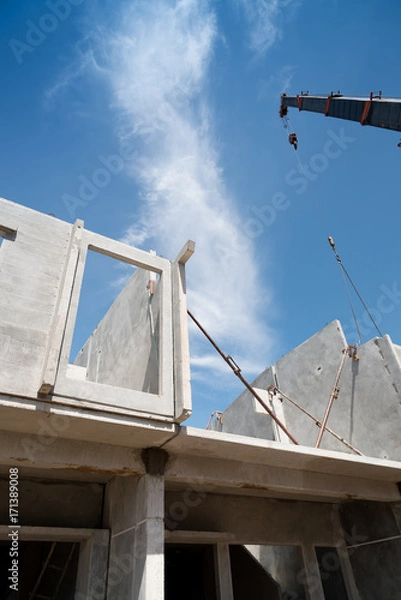 Obraz Installation process of prefabricated wall panels.