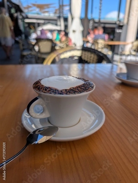 Fototapeta A cup of coffee in a café