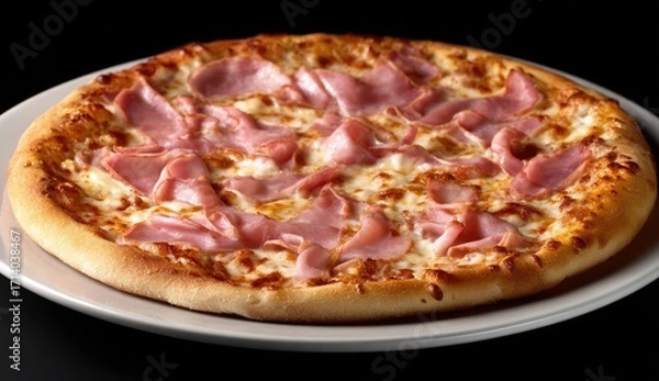 Fototapeta Close-up of a ham pizza on a plate