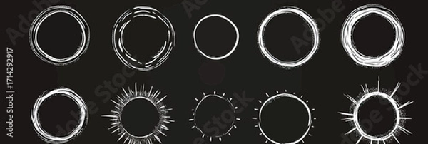 Fototapeta Hand drawn white chalk circle badge set with rustic grunge brush strokes and sunburst frames on black chalkboard background vector illustration for label and border design