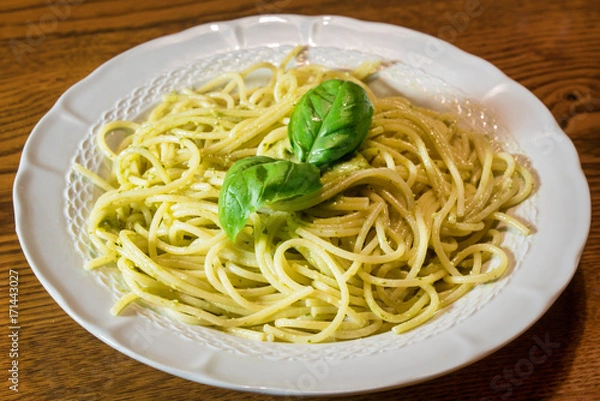 Obraz Spaghetti with pesto sauce.